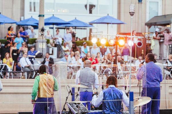 Live Music on the Harborwalk Terrace being played for a lively audience